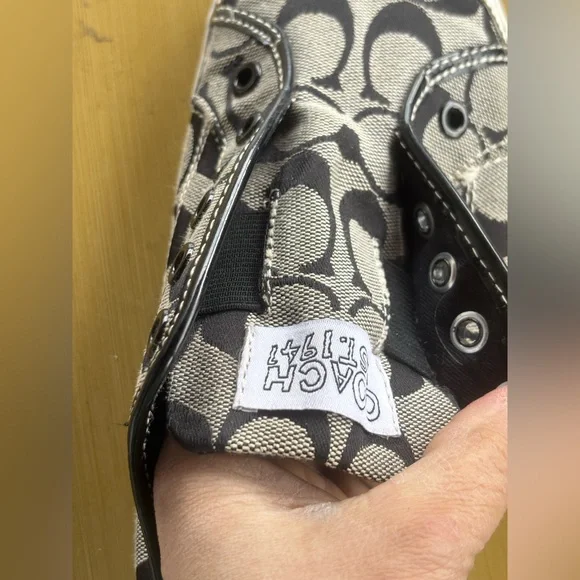 Coach slip on sneaker, black and white
Size 8 1/2 B - Picture 9 of 10